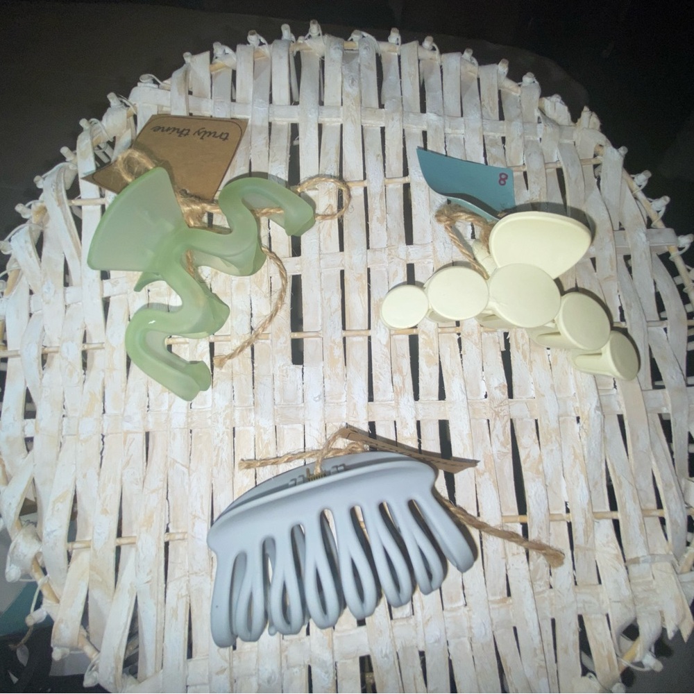 Set of Three Hair Clips in Green, Cream, and Grayish Blue.